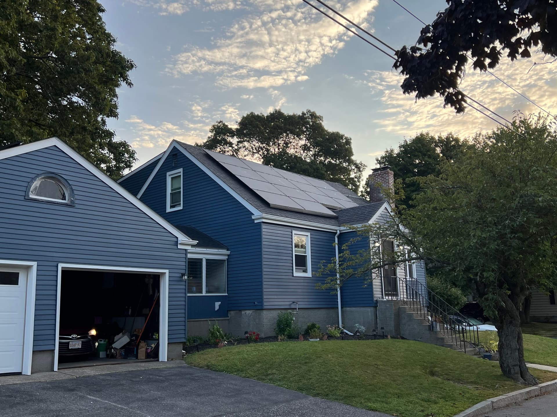 Froof roofing team working on residential roof installation project